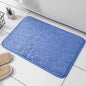 Water absorbing shower carpet